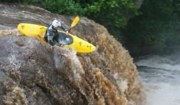 Canoeist going down Rainby Force. Canoeist going down Rainby Force, Park House Keld